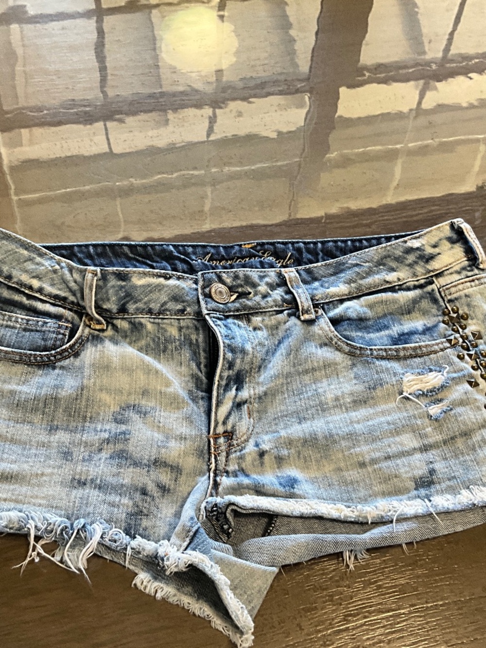 American Eagle Jean Shorts/ size 12 with metal beading, 100 % cotton